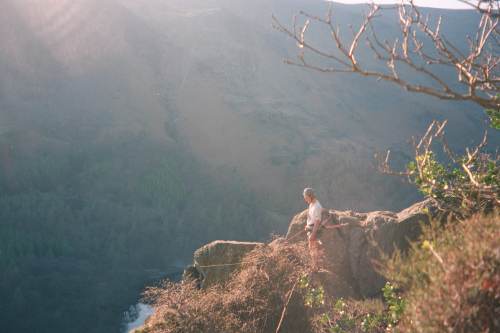 2002-04-07a.jpg - Roland belaying on Bowderstone Pinnacle