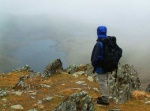 Mike looking down through the mist on Llyn Llydaw