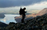 Helen navigating, with Ennerdale Water behind