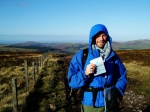 Steve presents his passport at the border...
