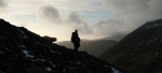 Random walker with dog on Great Gable