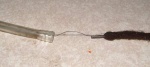 Use the cotton to thread some rough string (e.g. bootlace)