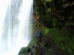 Shona passes behind the water