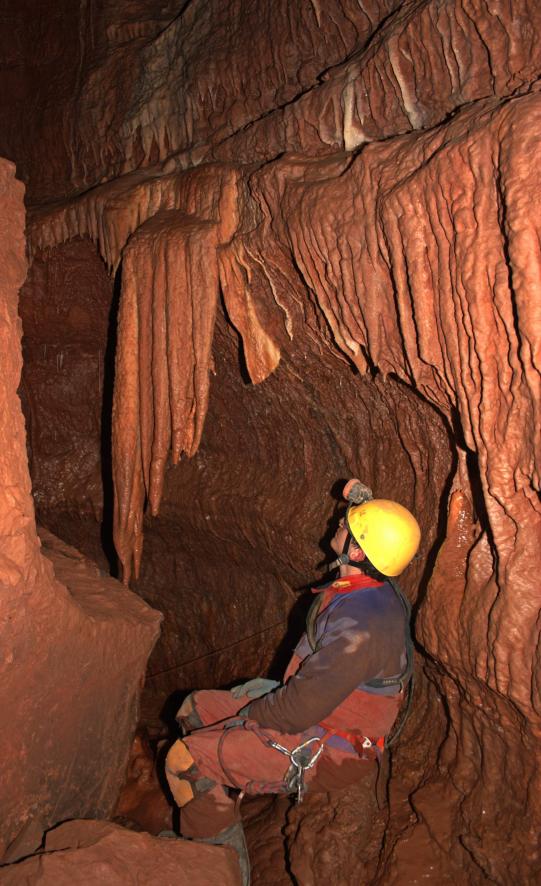 20050219-204710.jpg - Dave admires a stalactite in the passage