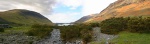 A patch of afternoon sun highlights Great How across Burnmoor Tarn