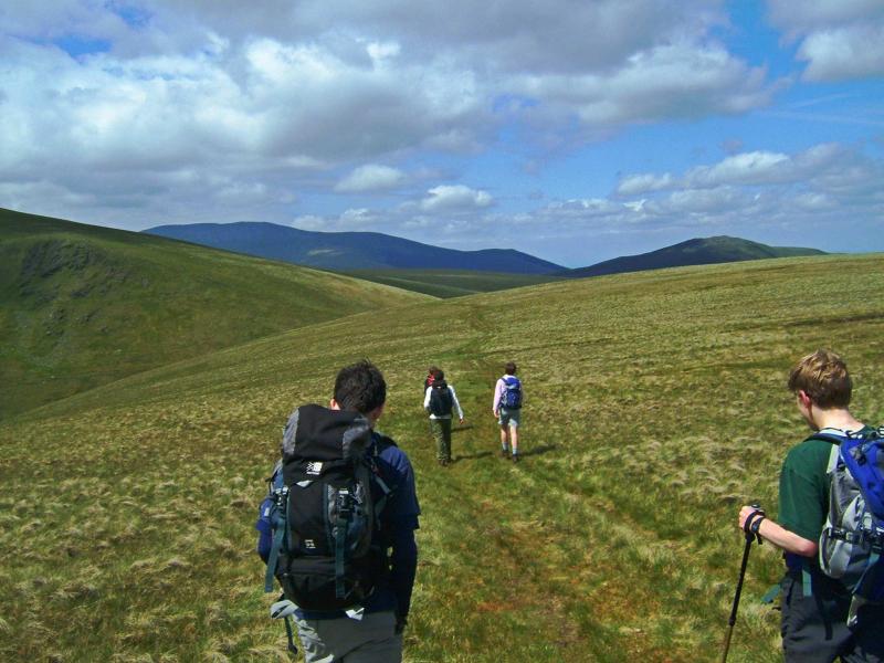 20050611-121452.jpg - Descending Bannerdale Crags, with Skiddaw and Great Calva in the distance