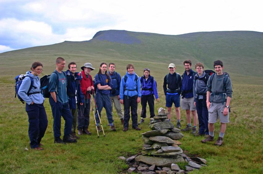 20050611-144956.jpg - Enormous combined group: Olivia, Rich, Matt, Peter, Joanna, Dave, Sarah, Becky, Will, Andrew, Dave and Michael at the "summit" of Mungrisedale Common
