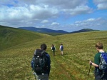 Descending Bannerdale Crags, with Skiddaw and Great Calva in the distance