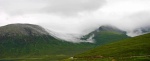 Cloud spilling over some Red Hills on the way home