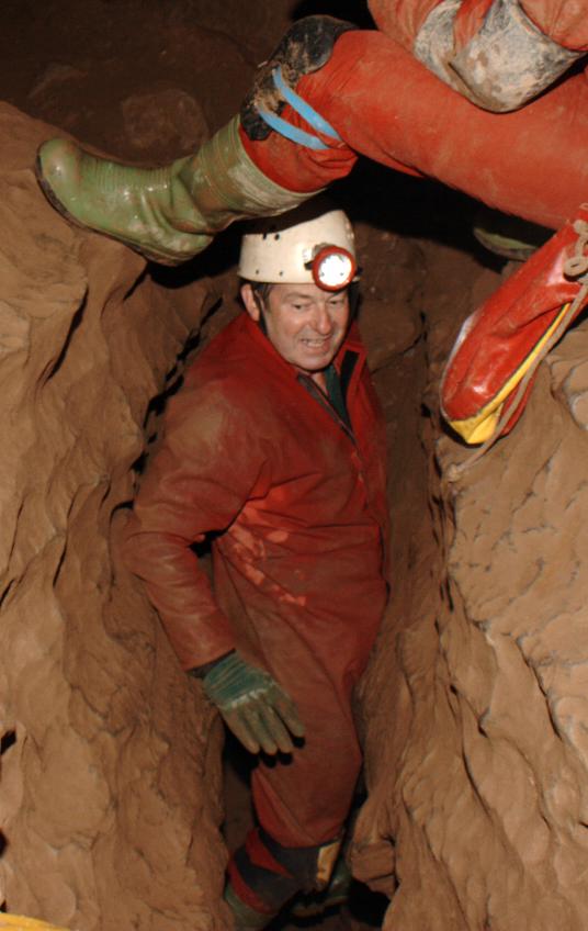 20050730-140724.jpg - Bill climbing out of an awkward rift