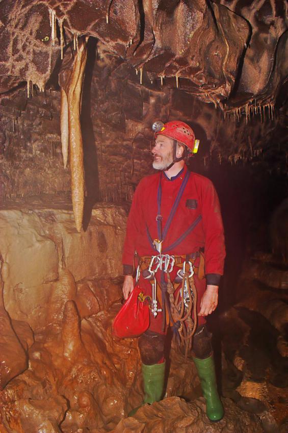 20051008-172426.jpg - John with a big stalactite in Easy Passage
