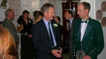 Martin and Roland converse amidst the throng