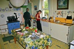 Adam and Sarah at work in the kitchen