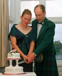 Carefully cutting the cake