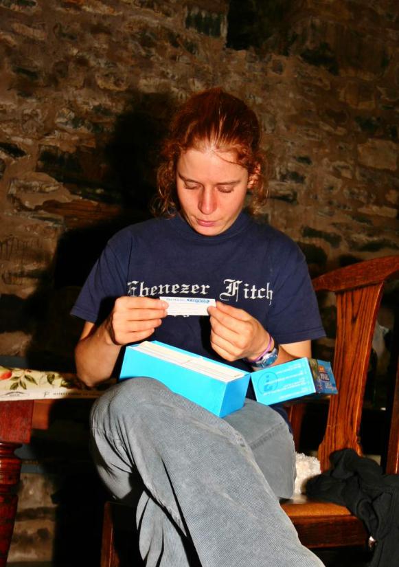 20051112-230220.jpg - Sarah attempts to de-Americanize (sorry, de-Americanise) by reading the "Britain in a Box" game