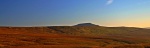 Ingleborough peeks over Whernside