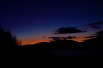 Sunset over a misty Glen Orchy and the hills beyond