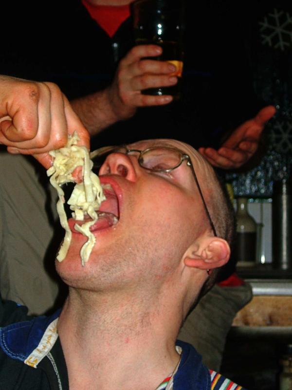 20060114-223628.jpg - Johnny deals with the students' leftovers