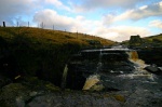 The beck disappears into the ground