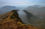 A wisp of cloud slips up Llechog as we descend