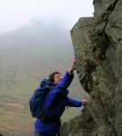 Sam reaches for a hold...
