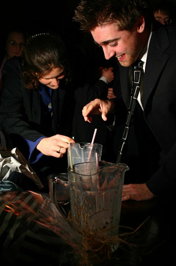 20060222-223506.jpg - Olivia and Alex share a cocktail or two