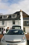 Ben Shieldaig looms behind the village and the car