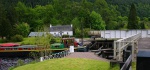 Boat passing through Laggan swing bridge