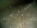 Mud sculptures near the fixed ladder