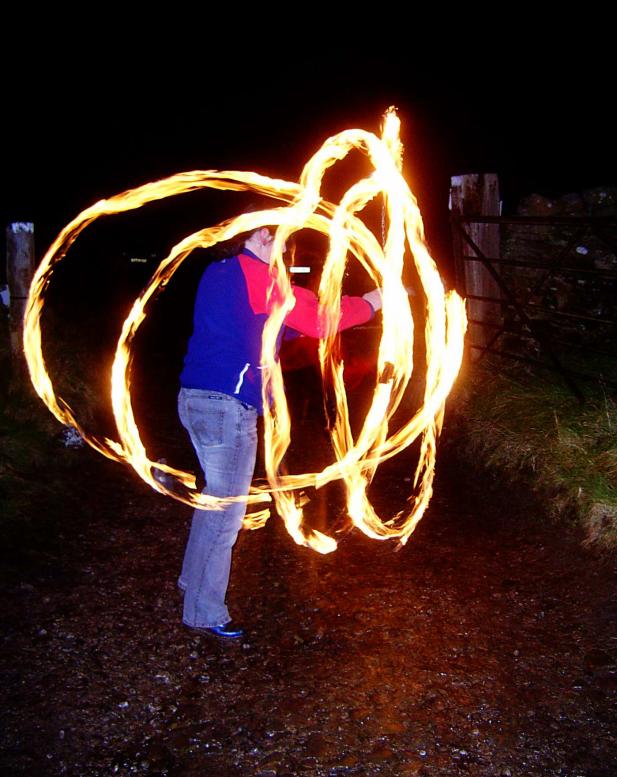 20061104-194526.jpg - Heather with fire-poi