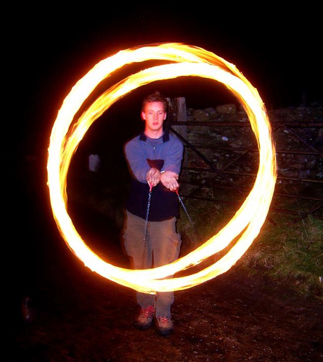 20061104-194658.jpg - George in fire-poi frame