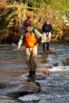 Anton crosses, followed by Helen and Tom