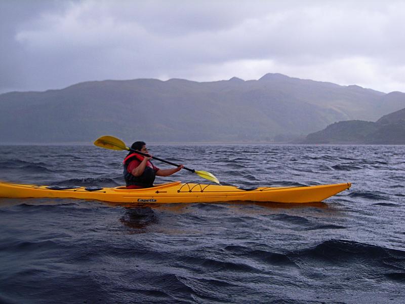 20070812-134232.jpg - Julia paddling in the rain
