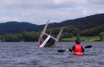 Catamaraners righting their boat