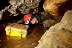 Richard emerges through a puddle