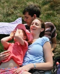 Is Katherine trying to adopt Andy and Roz?
