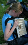 Ruth attempts the accordion