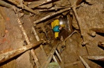 Alison climbing the entrance shaft