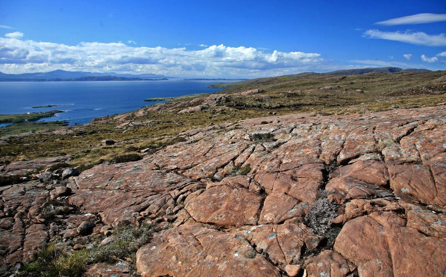 20090519-161256.jpg - Sandstone slab and the northern ends of Raasay and Skye