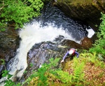 Looking down at Pete skirting the fall