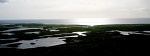 Sun on sea and lochan