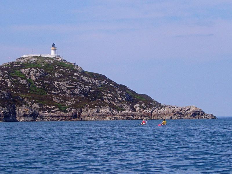 20090626-142615.jpg - Passing the lighthouse at the northern end of Rona