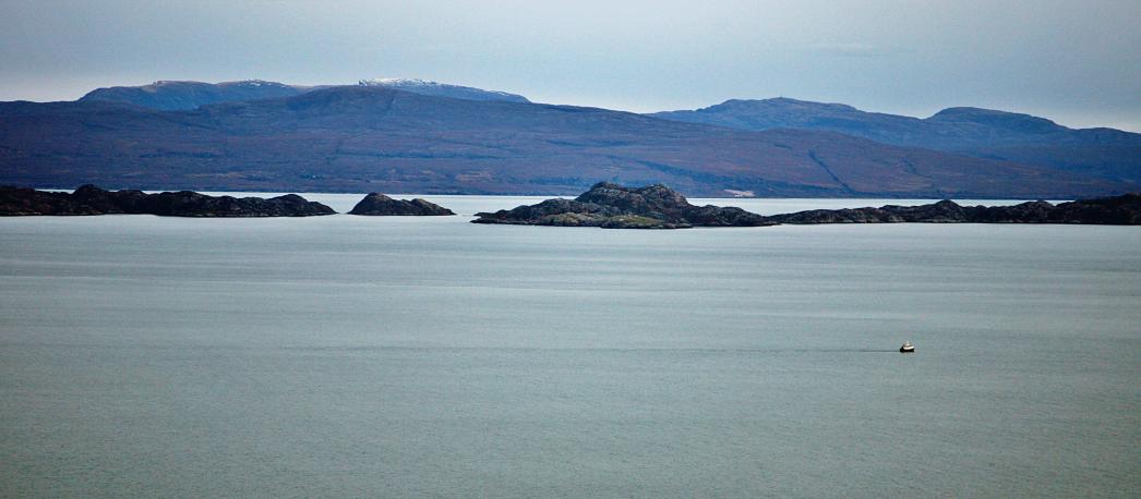 20101121-155223.jpg - Raasay and Rona with Applecross behind