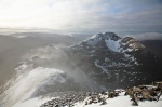 Snow flurries whip over the pinnacles