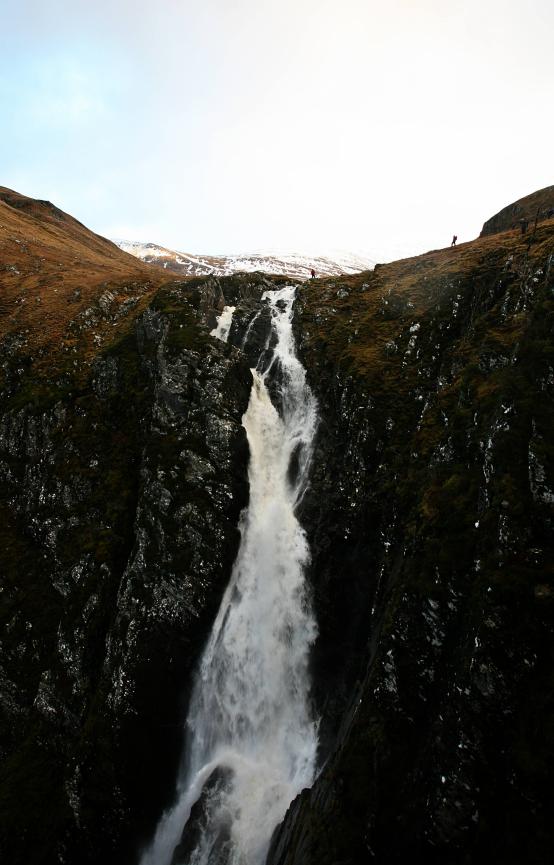 20140102-143723.jpg - Michael and others by the Falls