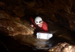 Simon takes the medical box through the sump bypass